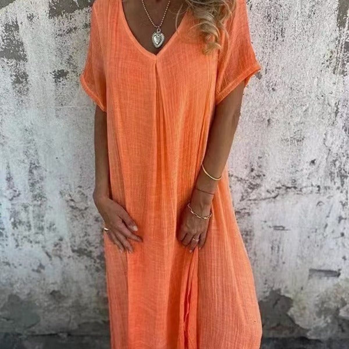 Loose V-neck dress with flowy silhouette and soft fabric