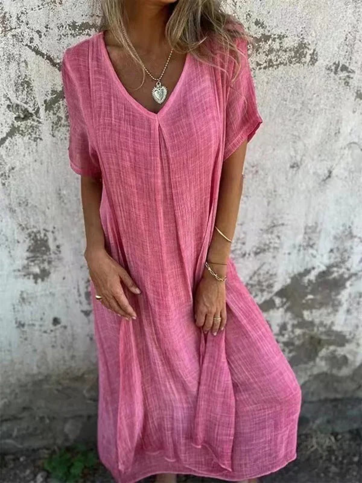 Loose V-neck dress with flowy silhouette and soft fabric