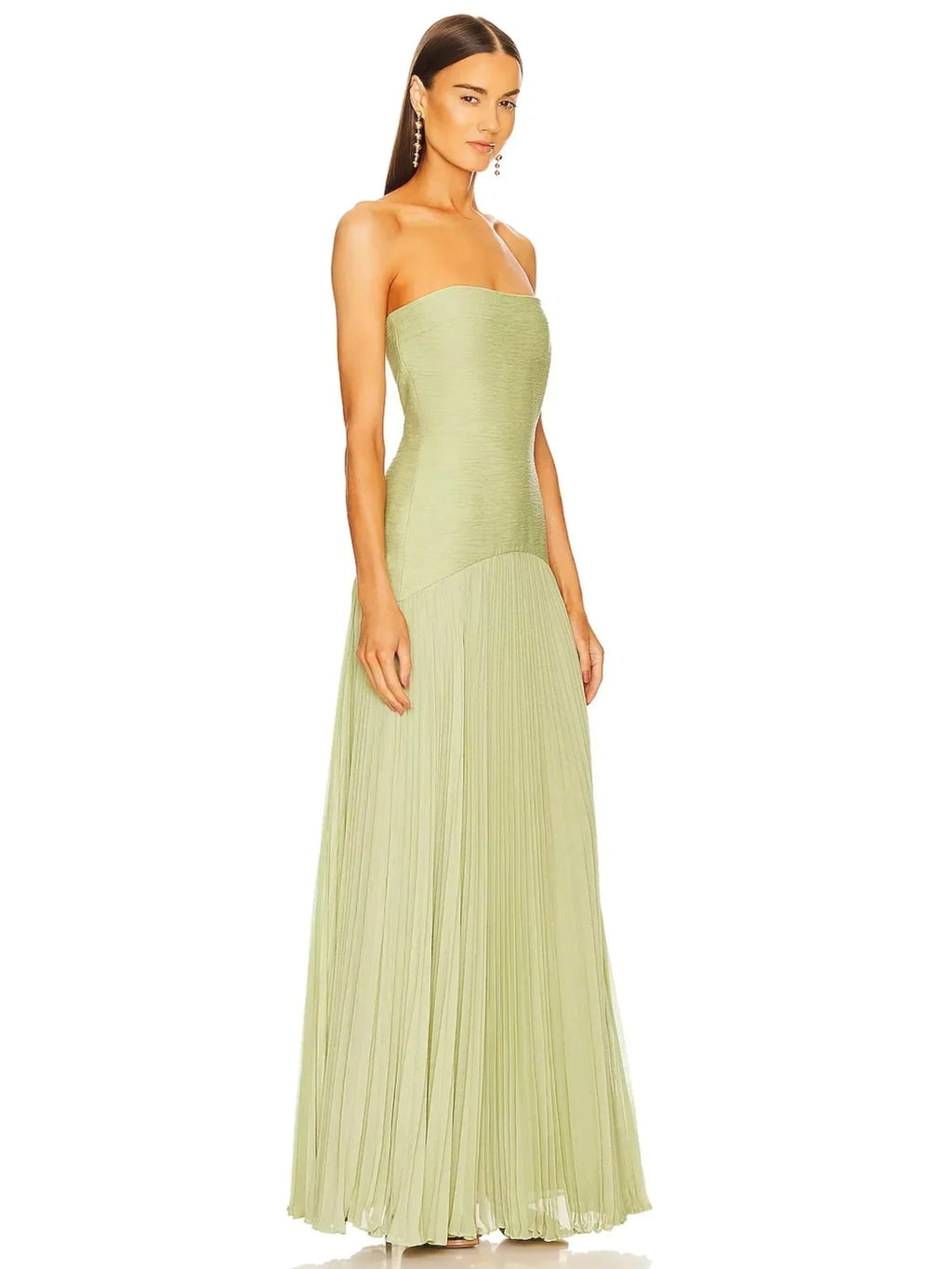 Strapless maxi dress with pleated skirt, worn at a formal event.