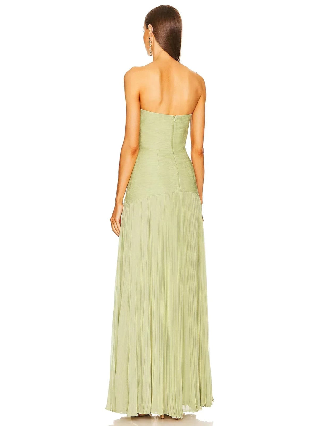 Strapless maxi dress with pleated skirt, worn at a formal event.