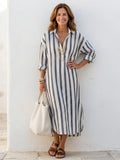 Women's striped long sleeve midi shirt dress with button front.