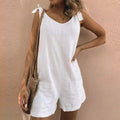Relaxed fit playsuit with bow straps and pockets.