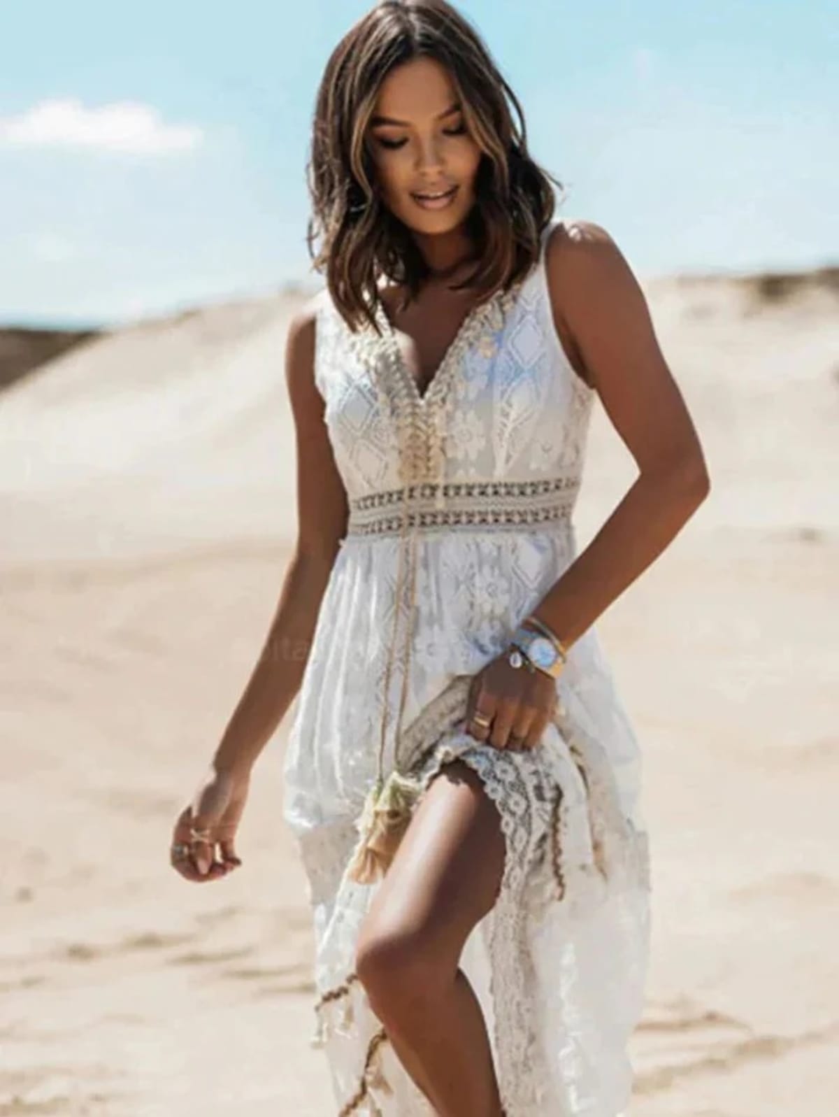 Bohemian style dress with V-neckline and cinched waist.