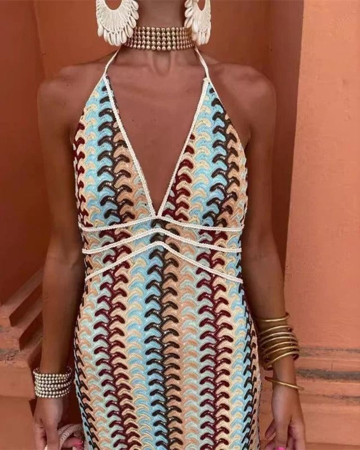 Crochet draped dress with intricate detailing for beach weddings