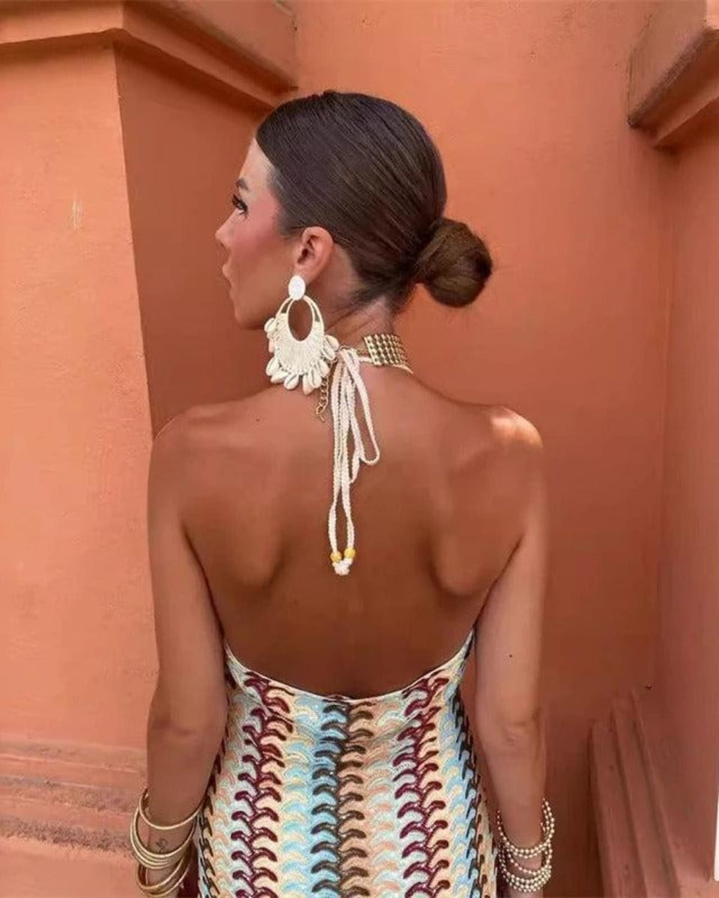 Crochet draped dress with intricate detailing for beach weddings