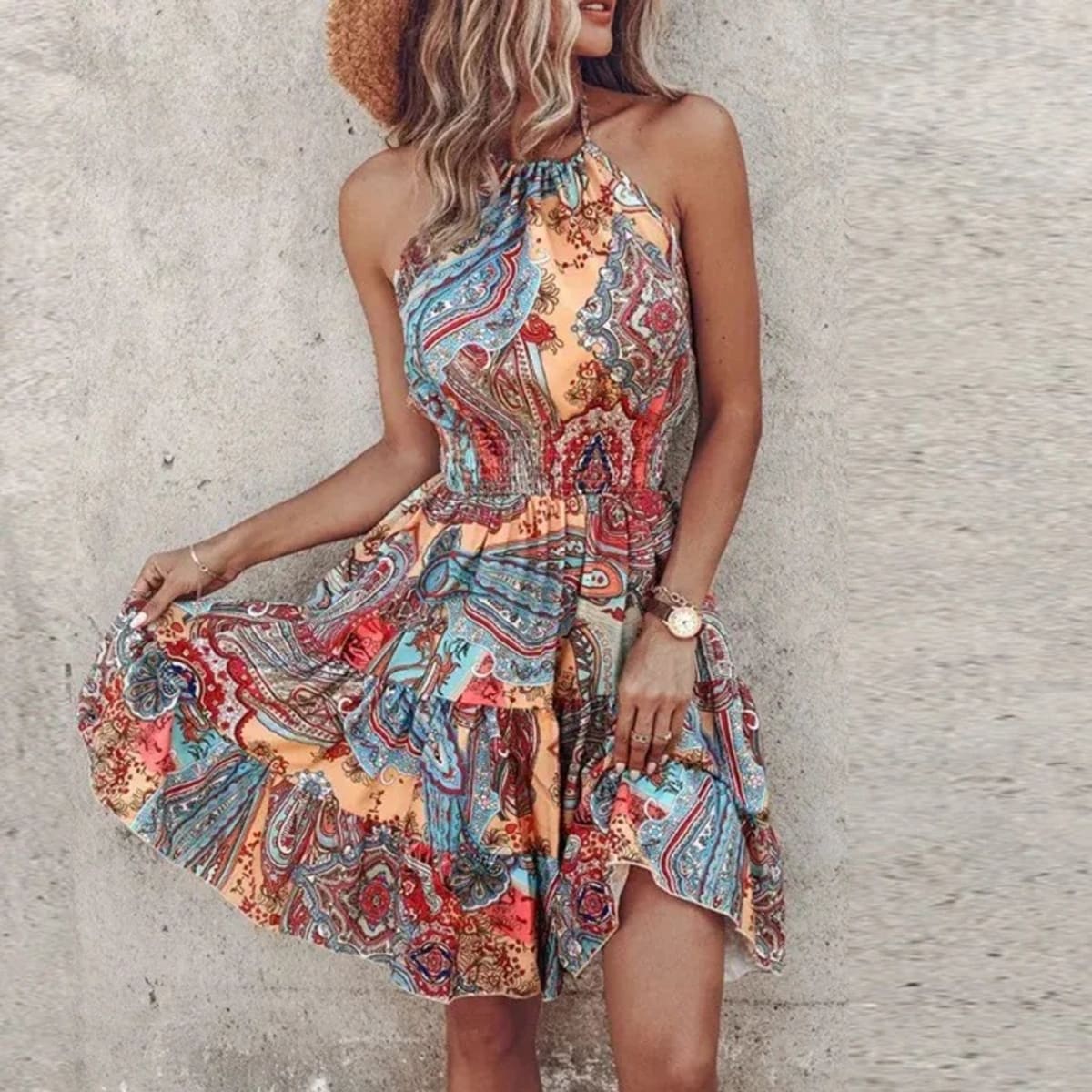 Women's draped lace halter dress with a flowy silhouette.