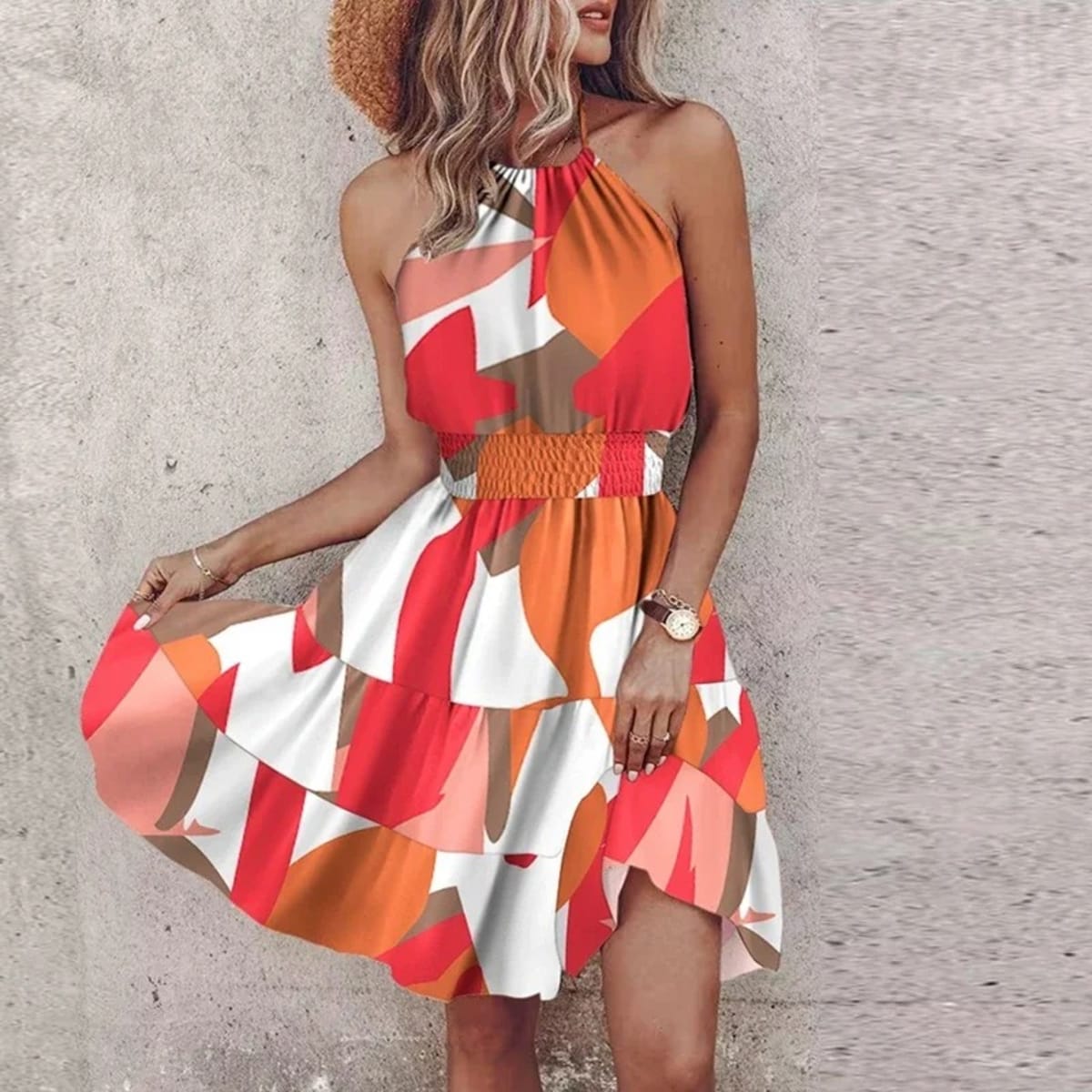 Women's draped lace halter dress with a flowy silhouette.