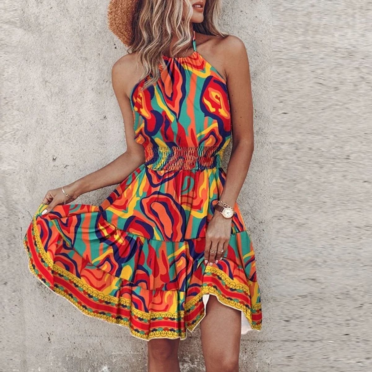 Women's draped lace halter dress with a flowy silhouette.