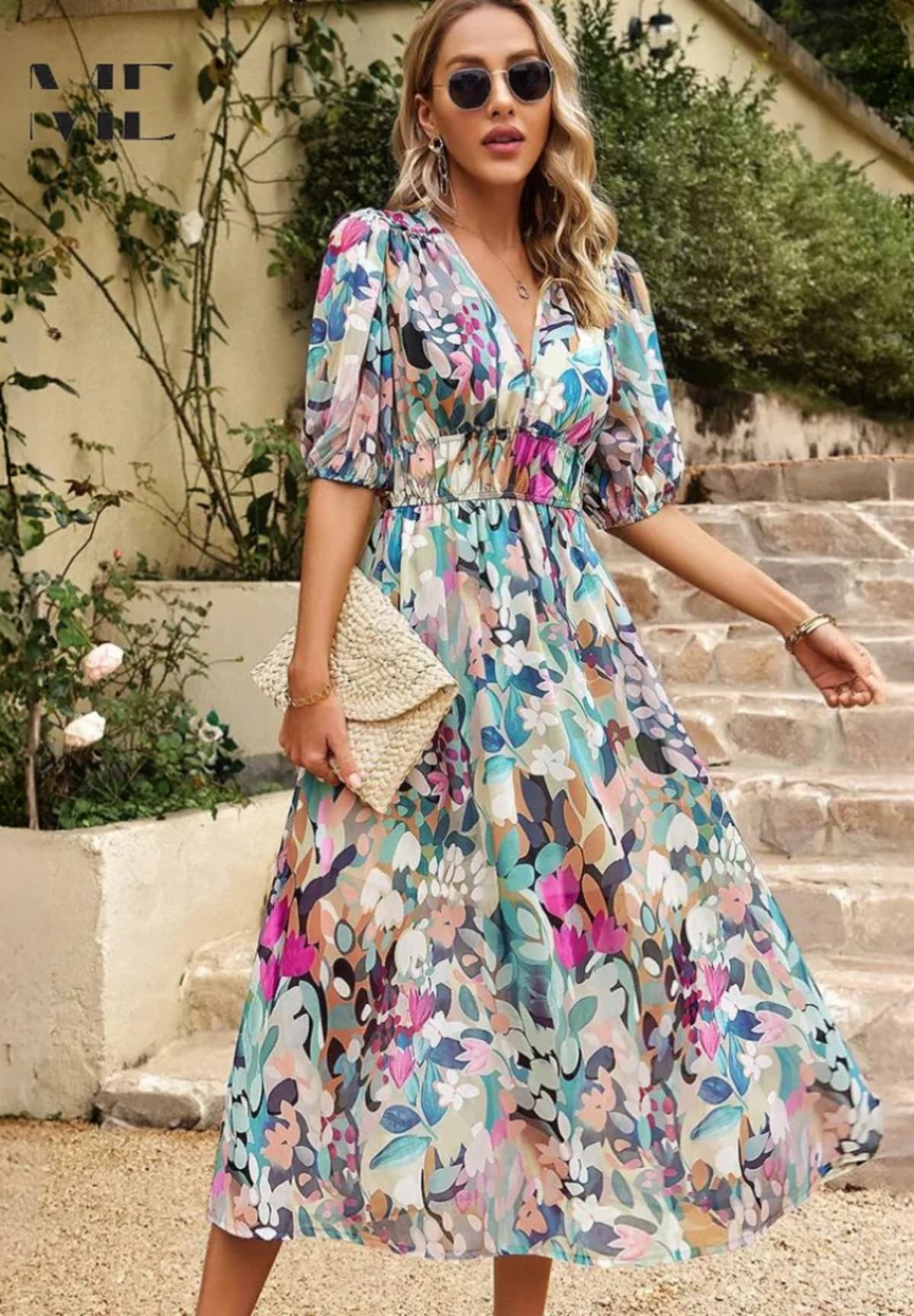 Women's A-line dress with floral print in lightweight fabric.