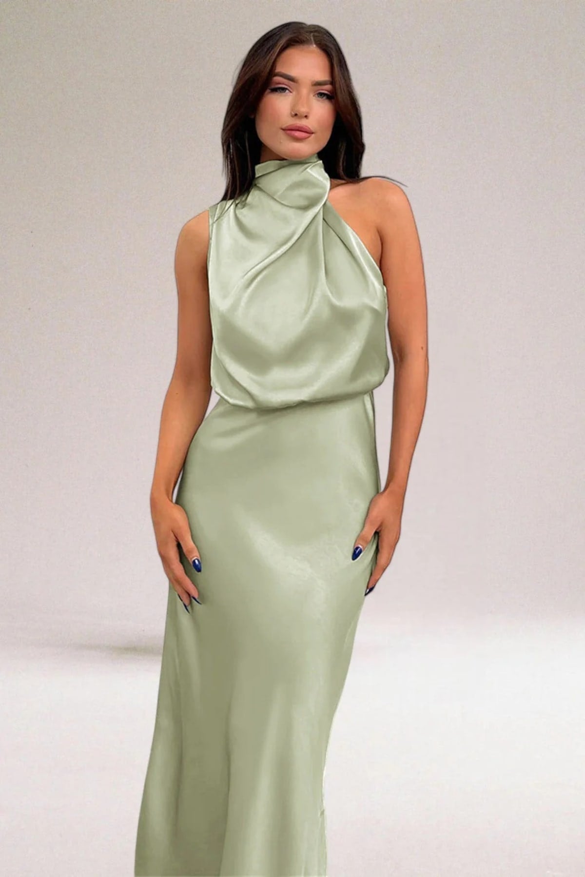 Halter neck evening dress with sleek silhouette and flowing fit.