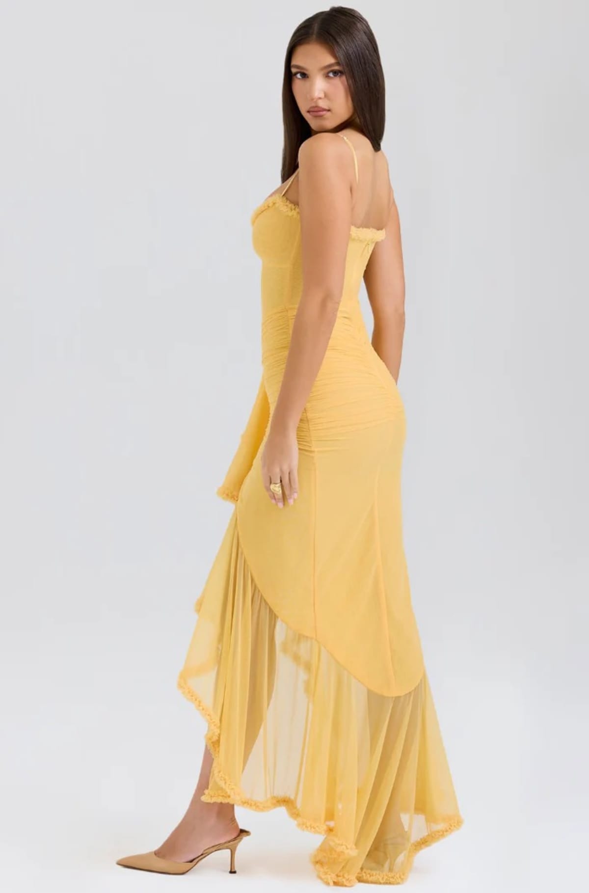 Lace dress with ruching and dovetail hem, wedding guest style.