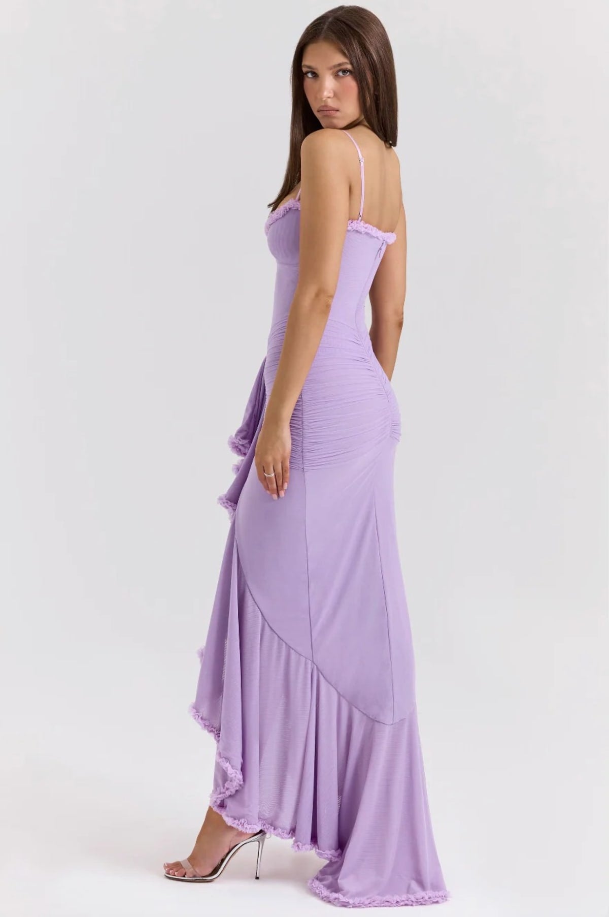 Lace dress with ruching and dovetail hem, wedding guest style.