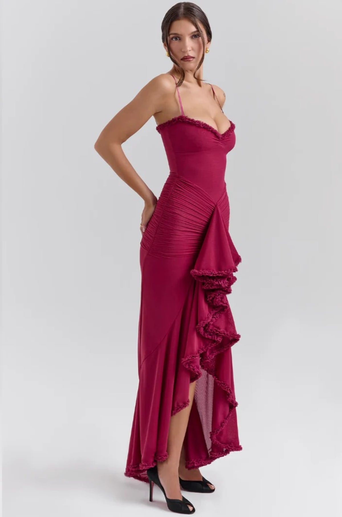 Lace dress with ruching and dovetail hem, wedding guest style.