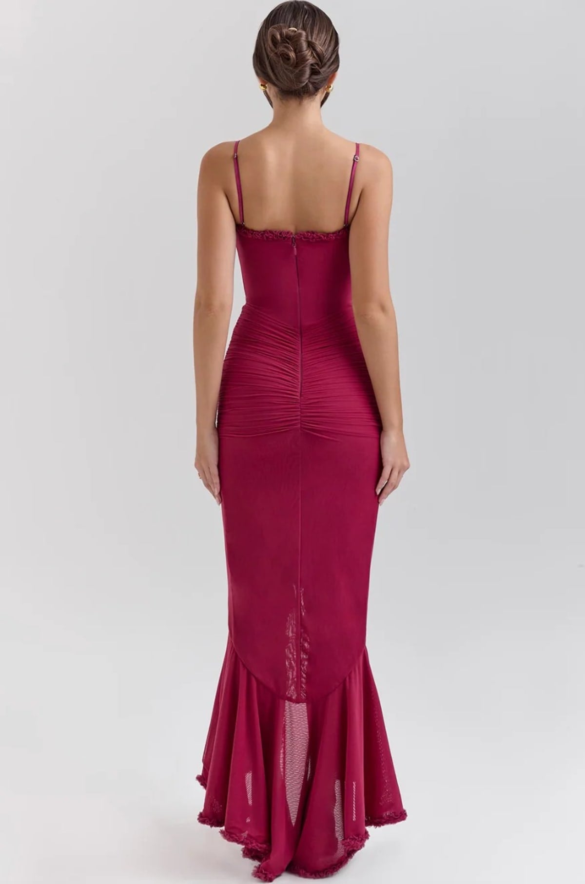 Lace dress with ruching and dovetail hem, wedding guest style.