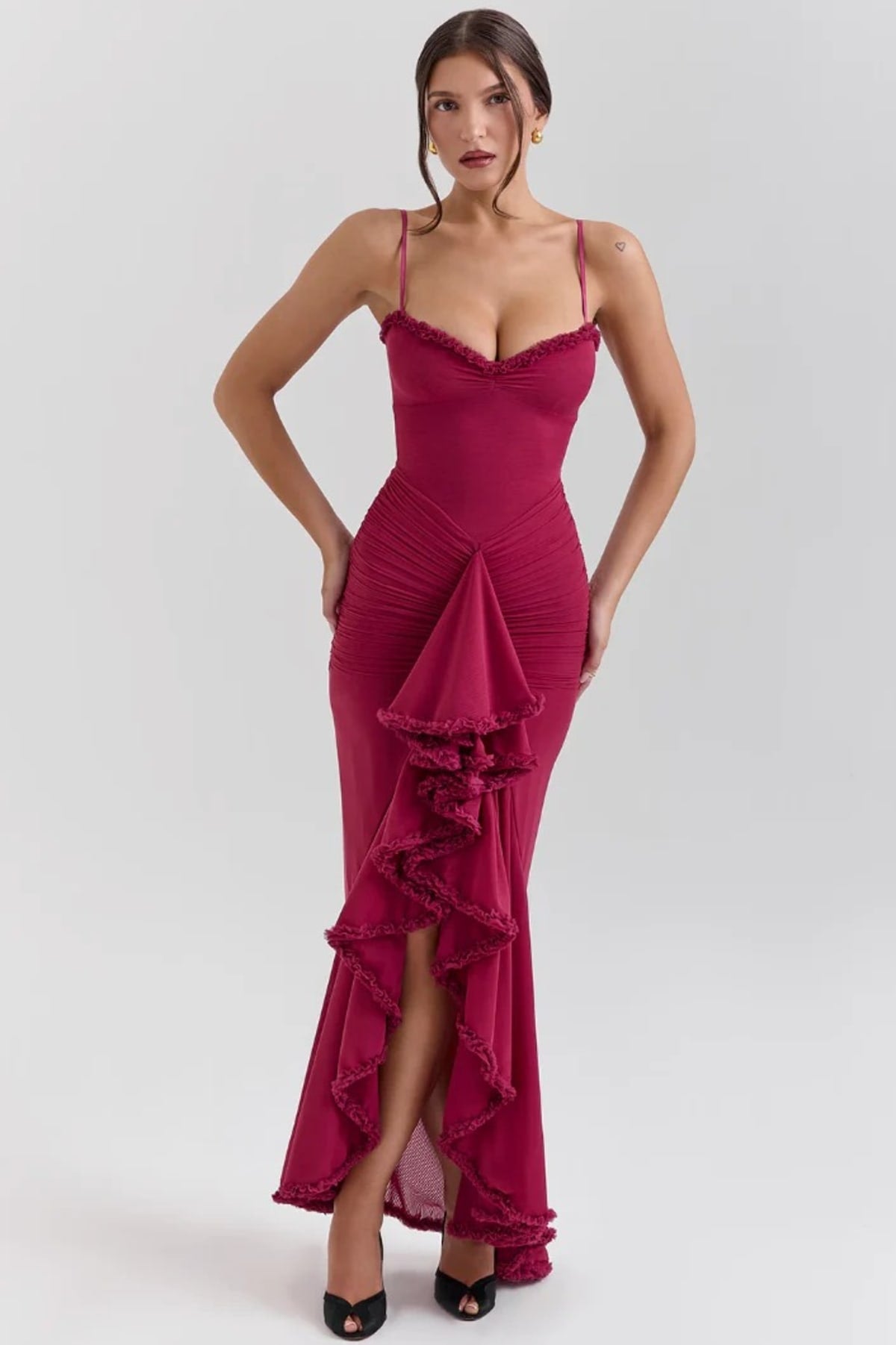 Lace dress with ruching and dovetail hem, wedding guest style.