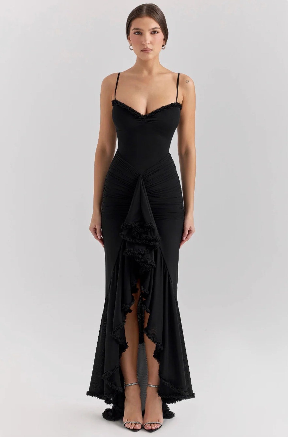 Lace dress with ruching and dovetail hem, wedding guest style.