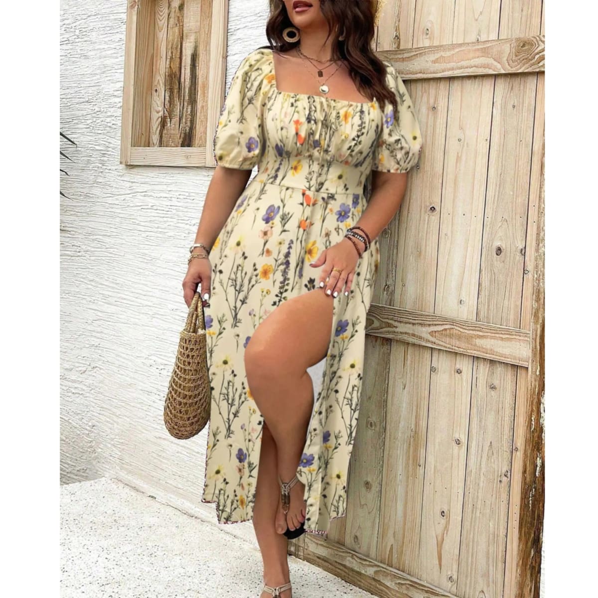Plus size maxi dress with puff sleeves and flattering fit.