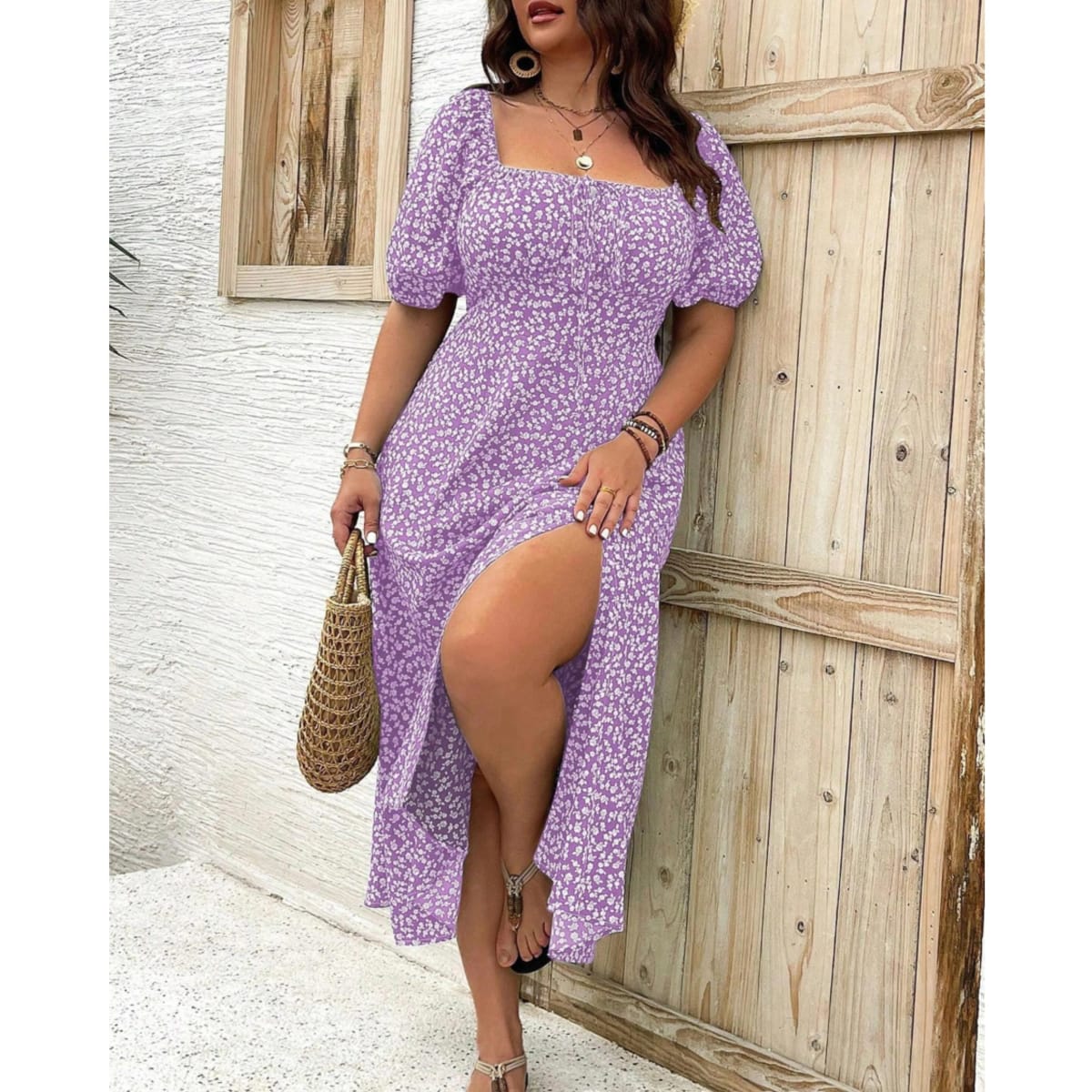 Plus size maxi dress with puff sleeves and flattering fit.