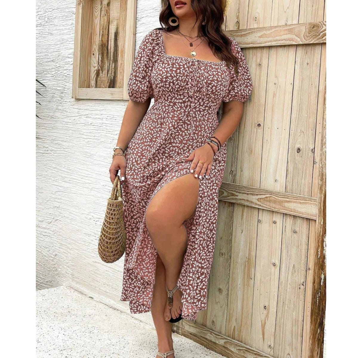 Plus size maxi dress with puff sleeves and flattering fit.