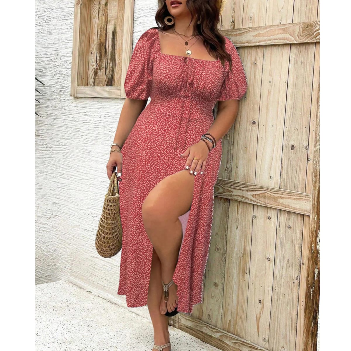 Plus size maxi dress with puff sleeves and flattering fit.