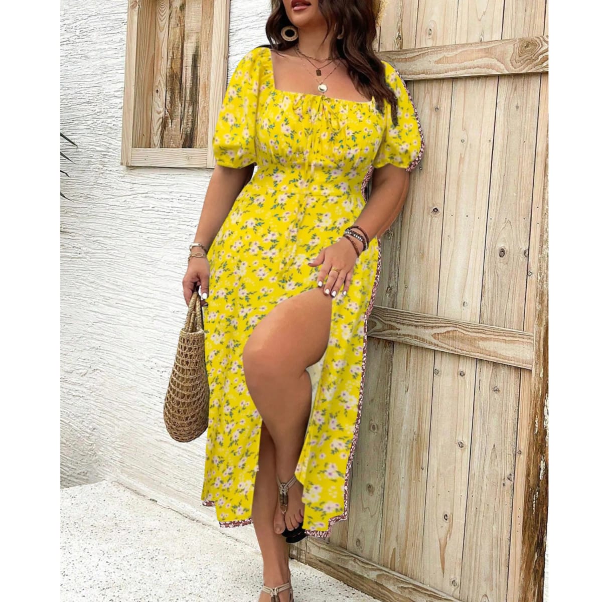 Plus size maxi dress with puff sleeves and flattering fit.