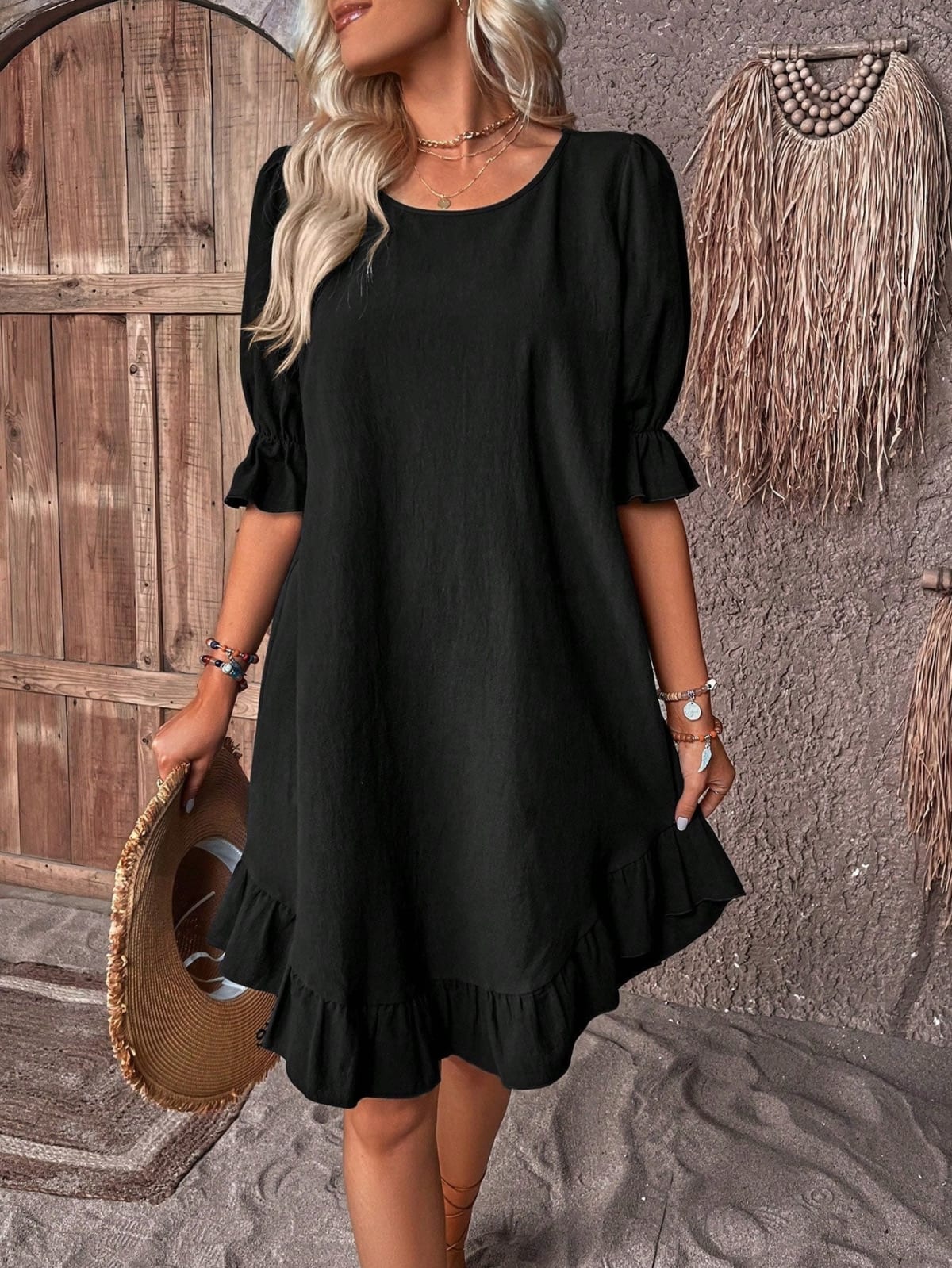Woman wearing a relaxed fit ruffle summer dress