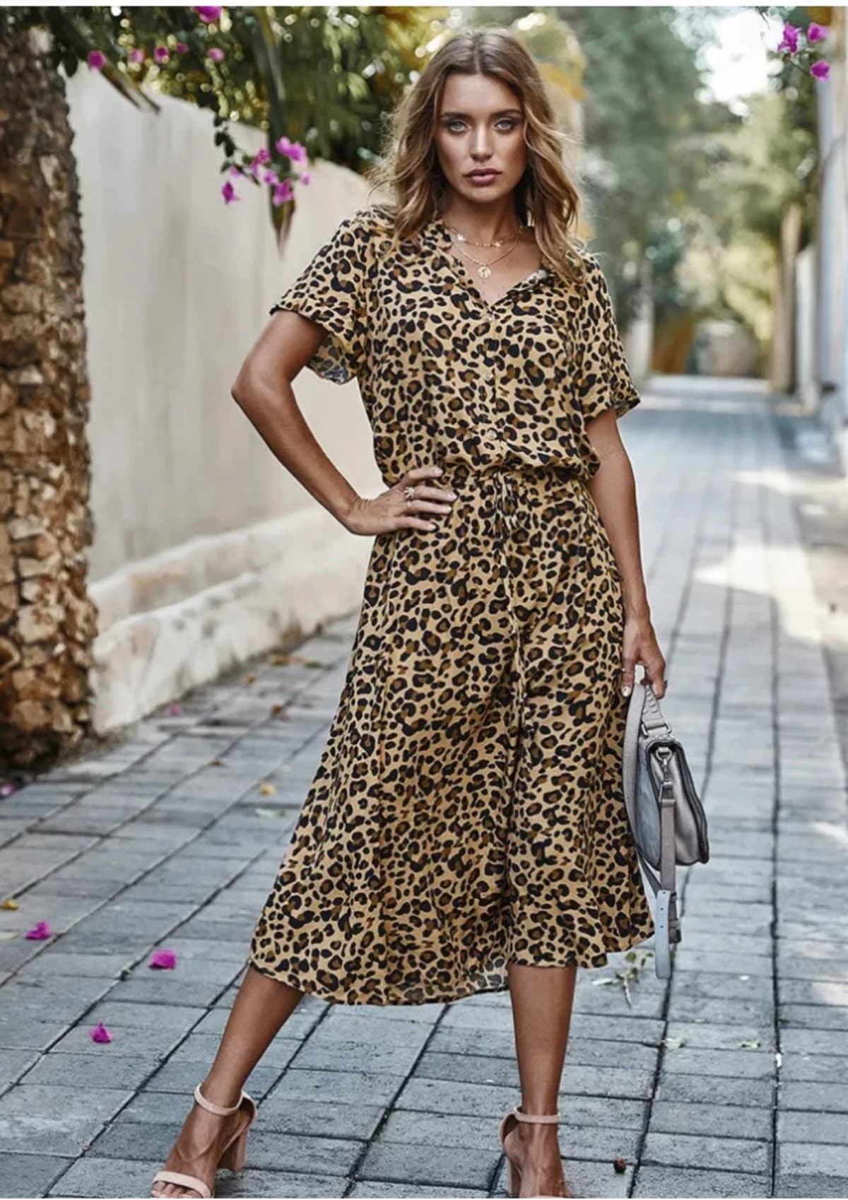 Spotted midi dress with button-down front and drawstring waist.