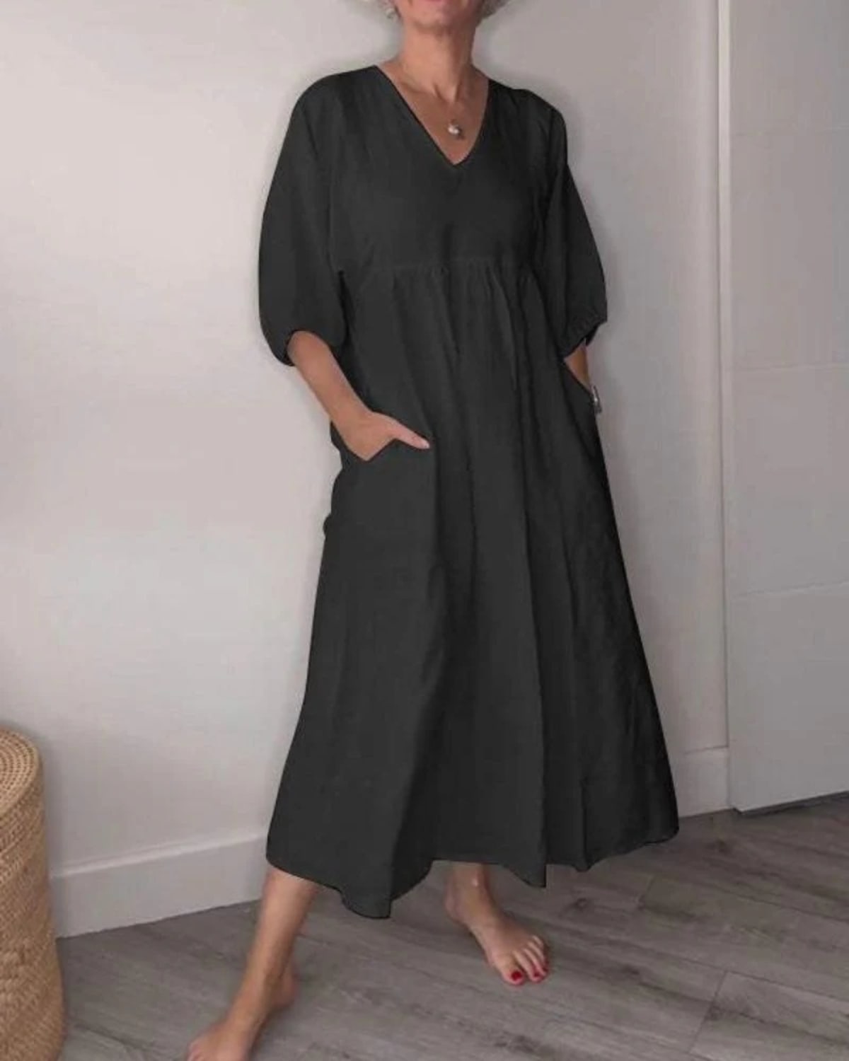 V-neck maxi dress with flowing silhouette for summer.
