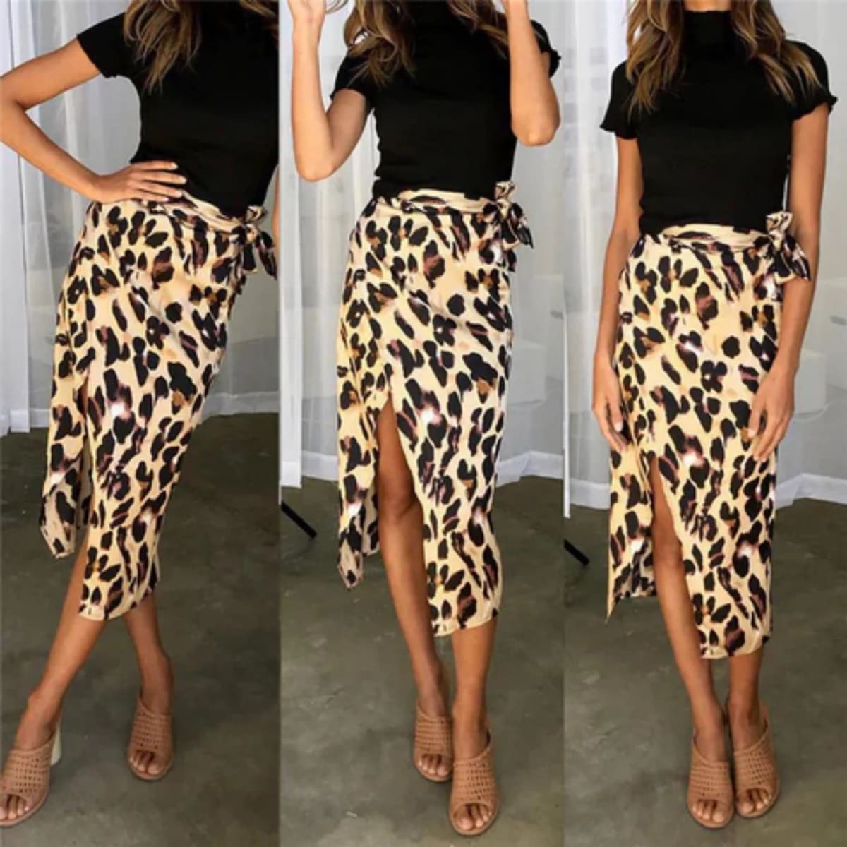 Close-up of a leopard print wrap midi skirt with a high slit.