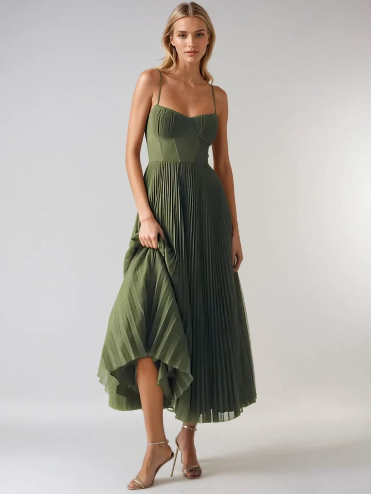 Maxi dress with structured bodice and pleated skirt, sweetheart neckline.