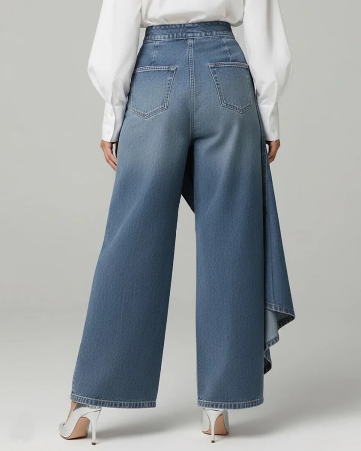 High-waisted wide-leg pants with an asymmetrical wrap front.